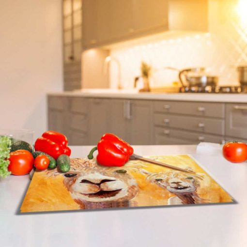 Alpacas glass cutting board on kitchen counter