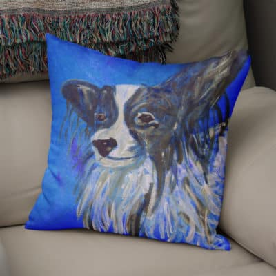 Blue cushion with Papillon dog image
