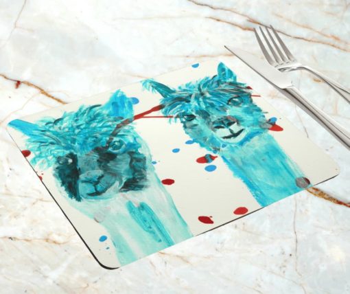 Blue alpacas placemat on marble surface