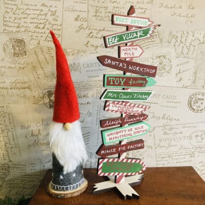 Christmas gnome and signpost small