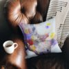 Purple rhino cushion on an armchair