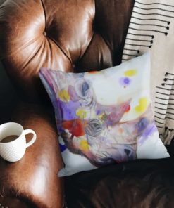 Purple rhino cushion on an armchair