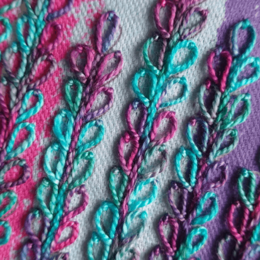 Close-up of delphinium embroidery kit in cerise