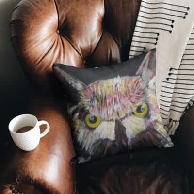 Faux suede cushion with colourful owl design