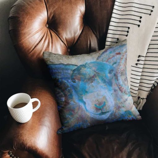 Blue cushion with horned ram image