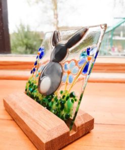 Grey bunny fused glass tile side view