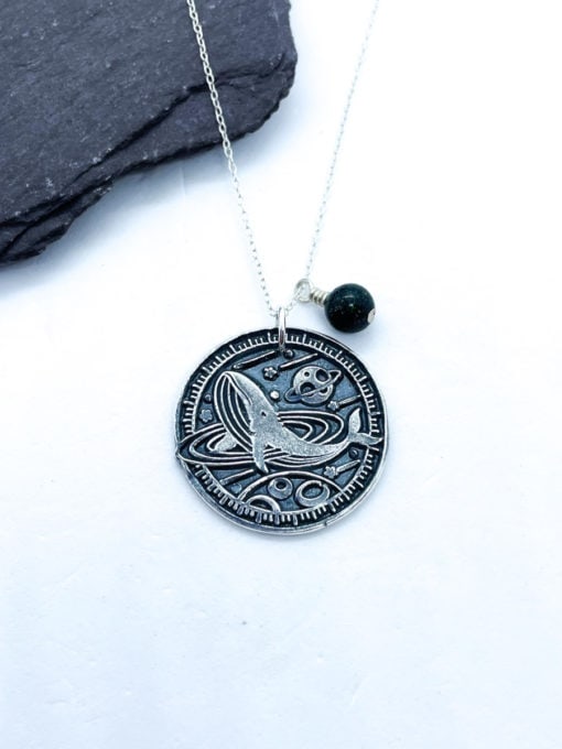 Silver whale pendant