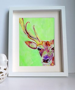 Red deer artwork in frame
