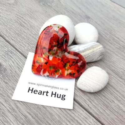 Red and green fused glass heart hug