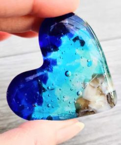 Spinnaker Glass beach pebble cast glass heart in hand
