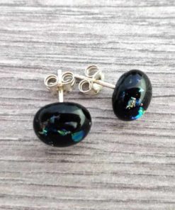 Spinnaker Glass black fused glass and sterling silver earrings on wooden tabletop