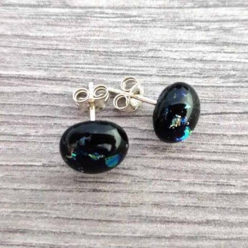 Spinnaker Glass black fused glass and sterling silver earrings on wooden tabletop