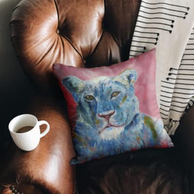 Square throw pillow with lion design