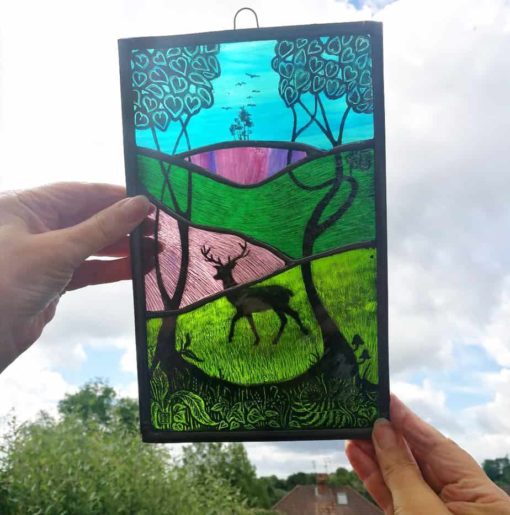 reindeer landscape stained glass