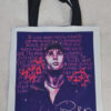 Tote bag with illustrated portrait, artistic text background, black handles, and the signature "Ren" at the bottom.