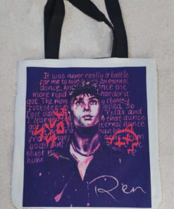 Tote bag with illustrated portrait, artistic text background, black handles, and the signature "Ren" at the bottom.