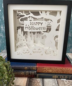 Framed Halloween paper art with 