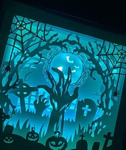 Glowing Halloween scene with rising zombie hands, tombstones, jack-o-lanterns, spider webs, and bats against a full moon.