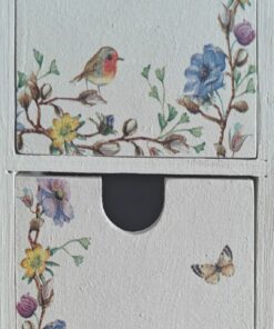 Decorative drawers with floral and bird design, featuring a robin and blue tit among colorful flowers and butterflies.