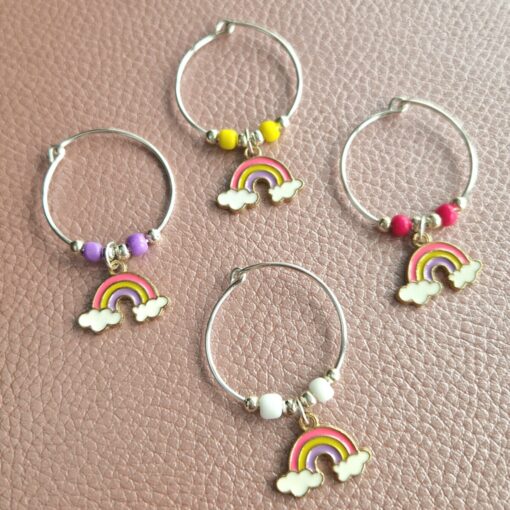 Handmade wine glass accessories with rainbow charms, ideal as creative wine glass identifiers for special occasions.