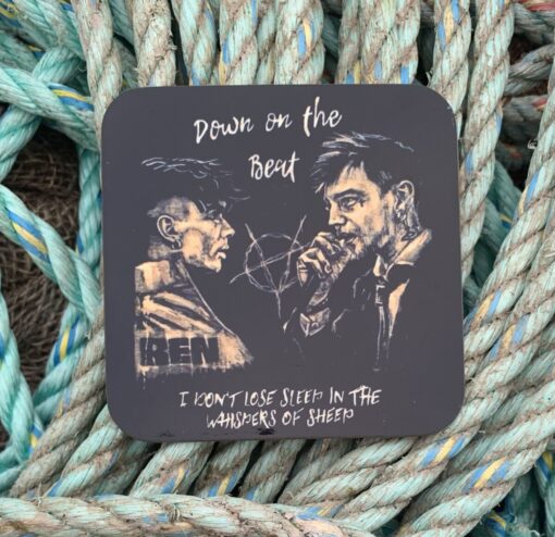 Illustrated coaster with two men, text reads "Down on the Beat" and "I don't lose sleep in the whispers of sheep," on rope background.