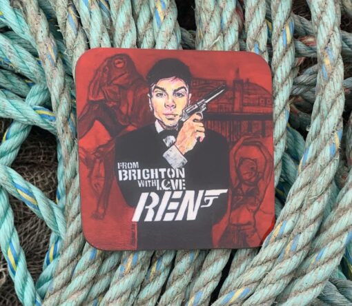 Illustrated coaster on ropes features a suited person with a gun, titled "From Brighton with Love Ren.