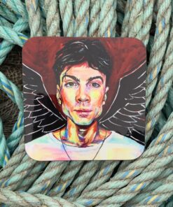 Colorful portrait of a person with angel wings on a coaster, placed on coiled ropes.