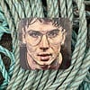 Artwork of a person with glasses on a square coaster, placed on intertwined ropes in blue and teal tones.