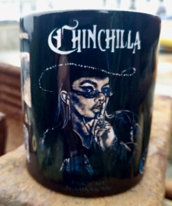 Black mug featuring a stylized illustration of a woman in sunglasses and hat, with "Chinchilla" text above.