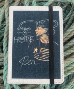 Notebook cover with illustration of a man, text "Some people know me as HOPE," and the name "Ren," against rope background.