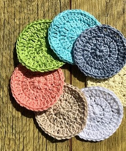 Set of 7 eco-friendly face scrubbies. A different colour for every day of the week. This shows all 7 colours