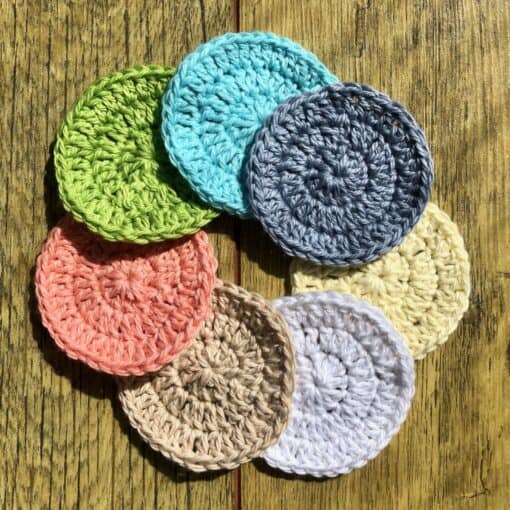 Set of 7 eco-friendly face scrubbies. A different colour for every day of the week. This shows all 7 colours
