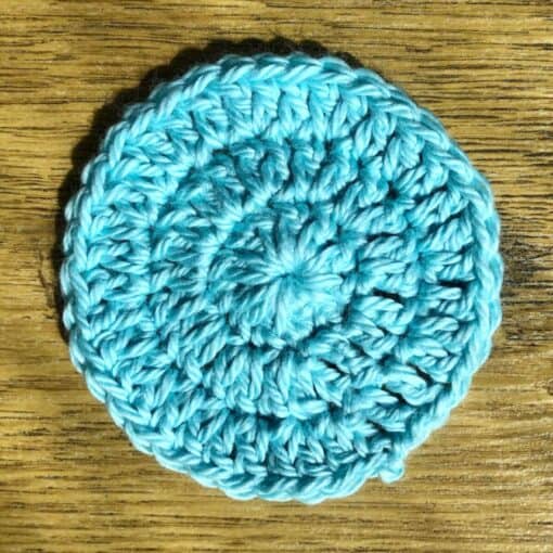 Set of 7 eco-friendly face scrubbies. A different colour for every day of the week. This shows a blue one