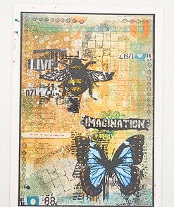 Mixed media art with a bee, butterfly, and text saying 