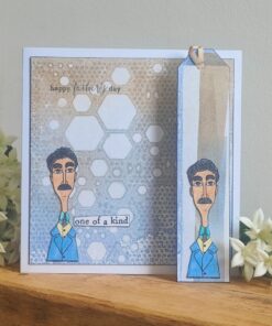 Father’s Day card with hexagon design, sketch of a man in blue suit, "one of a kind" text, beside white flowers.