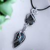 Unique black and white striped stone pendants; custom artisan jewellery with natural striped stone.