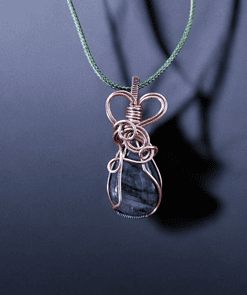 One-of-a-kind wire wrapped labradorite pendant with intricate copper design, part of unique pendant collections.