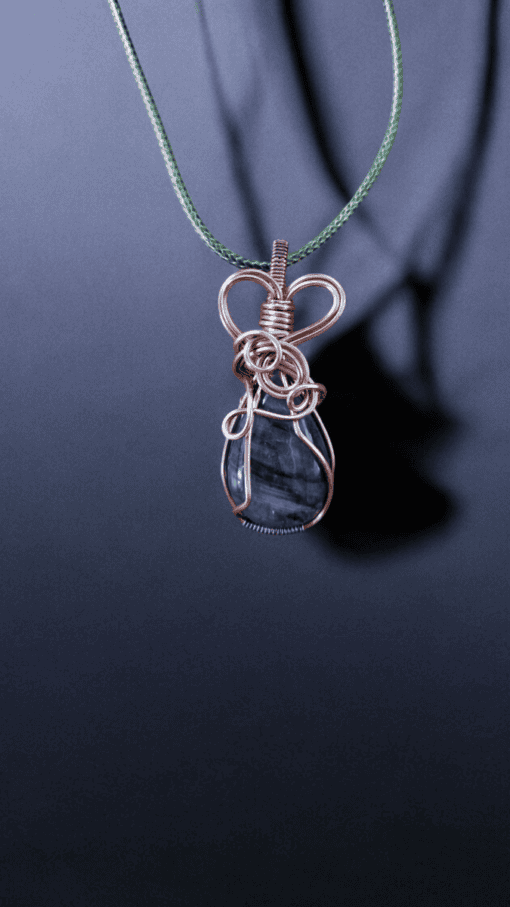 One-of-a-kind wire wrapped labradorite pendant with intricate copper design, part of unique pendant collections.