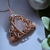 Bohemian vintage-style wire wrapped jewelry pendant with intricate design, ideal for unique wire wrap jewelry gifts.