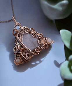 Bohemian vintage-style wire wrapped jewelry pendant with intricate design, ideal for unique wire wrap jewelry gifts.